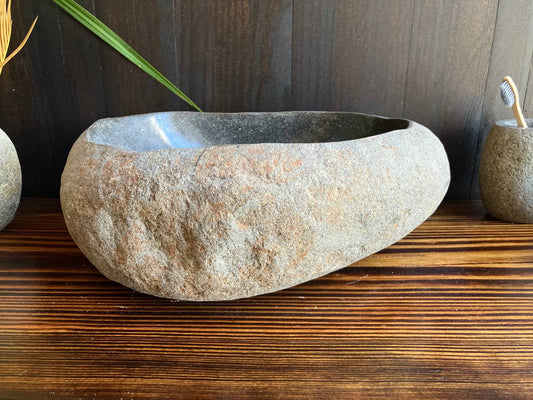 Front angled view of light-gray natural river stone sink RSS-017
