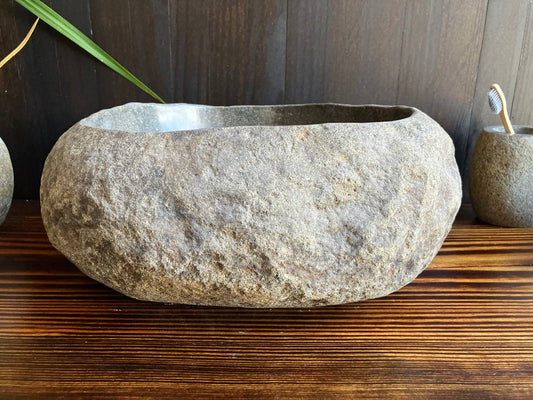 Front angled view of charcoal-gray natural river stone sink RSS-018