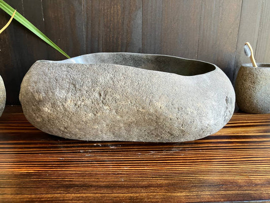 Front angled view of naturally veined river stone sink RSS-019