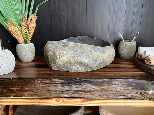 Premium dark river stone vessel sink RSS-023 in a bathroom vanity setting