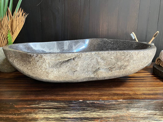 Front view of large irregular river stone sink RSS-032