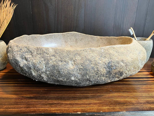 Front view of oval beige river stone sink RSS-034