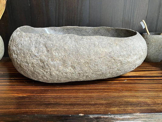 Front view of oval graphite river stone sink RSS-038