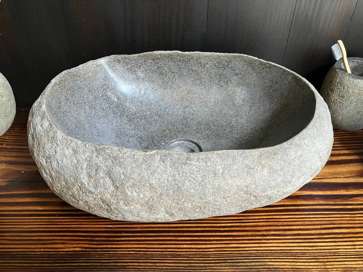 Side view of dark natural stone vessel sink RSS-038