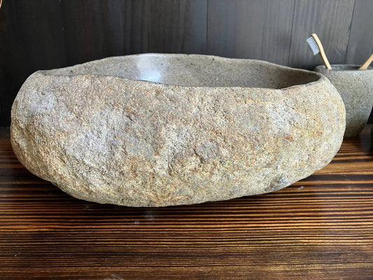 Front view of rounded natural river stone sink RSS-040