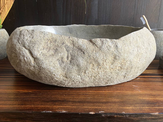 Front view of oval light-gray river stone sink RSS-042