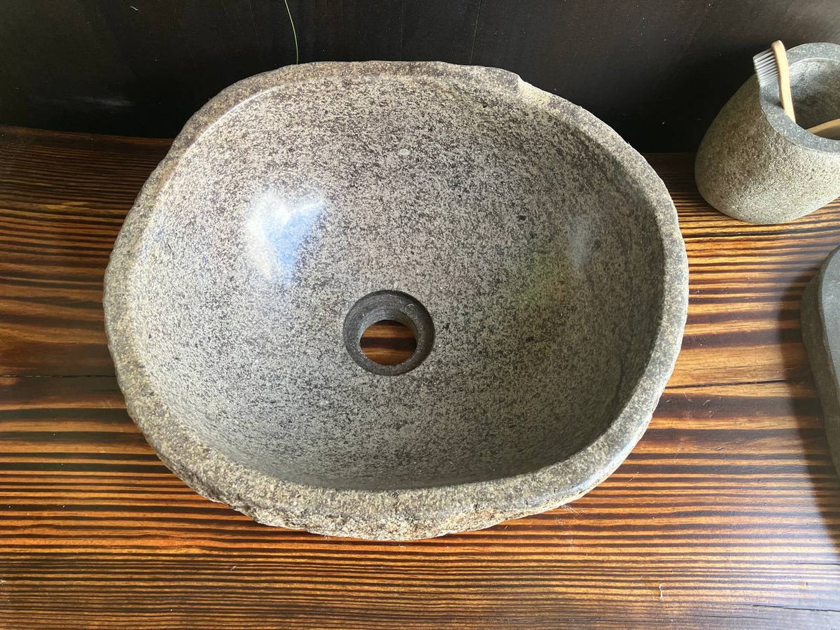 Top view of beige-brown rounded stone basin RSS-045