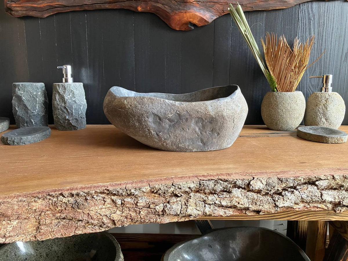 Dark gray organic river stone vessel sink with winding brown mineral vein – RSS-056