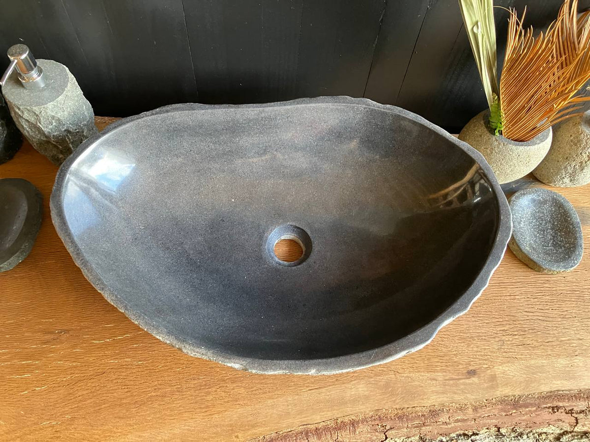 RSS-063 river stone vessel sink with charcoal polished interior and light textured natural exterior