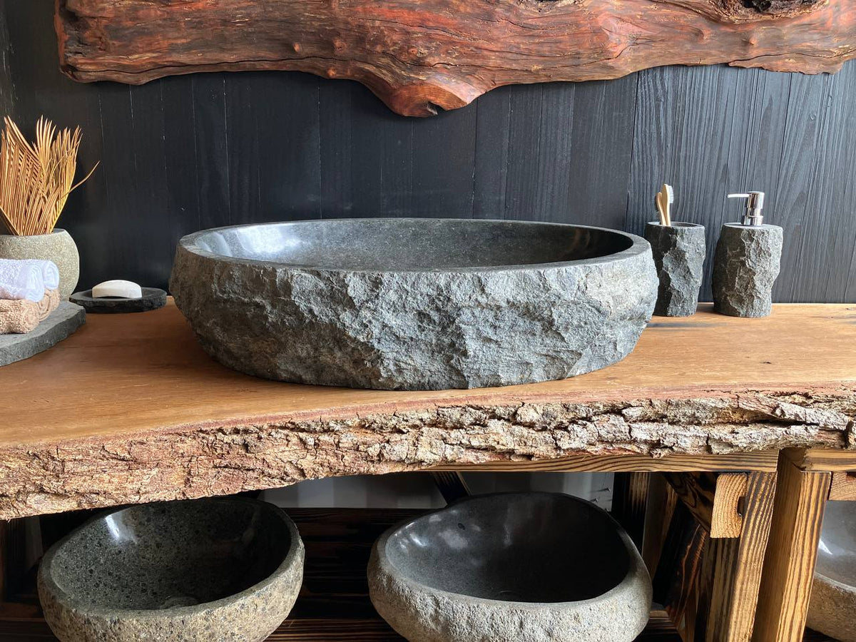 Large natural andesite stone vessel sink ANS-002 measuring 25.5 by 18.5 inches for above-counter bathroom installation