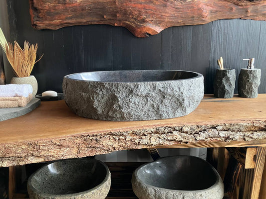 Natural andesite stone vessel sink ANS-003 measuring 24 by 16 inches for above-counter bathroom installation
