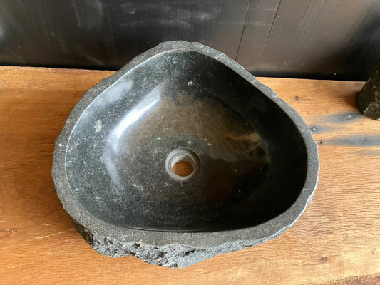 Natural andesite stone bathroom vessel sink ANS-007 showing its rough chiseled exterior and triangular form