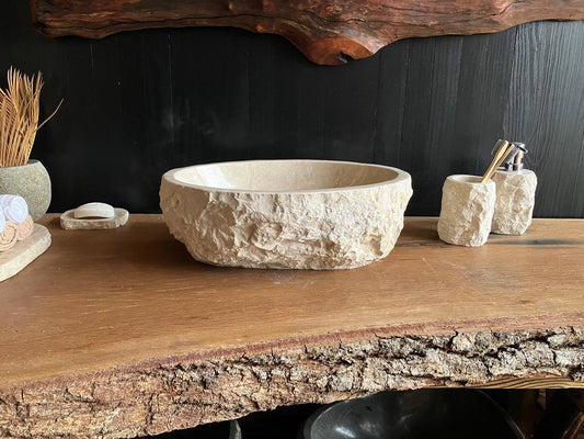Compact beige marble vessel sink BMS-008 with an oval shape and polished basin, viewed from above