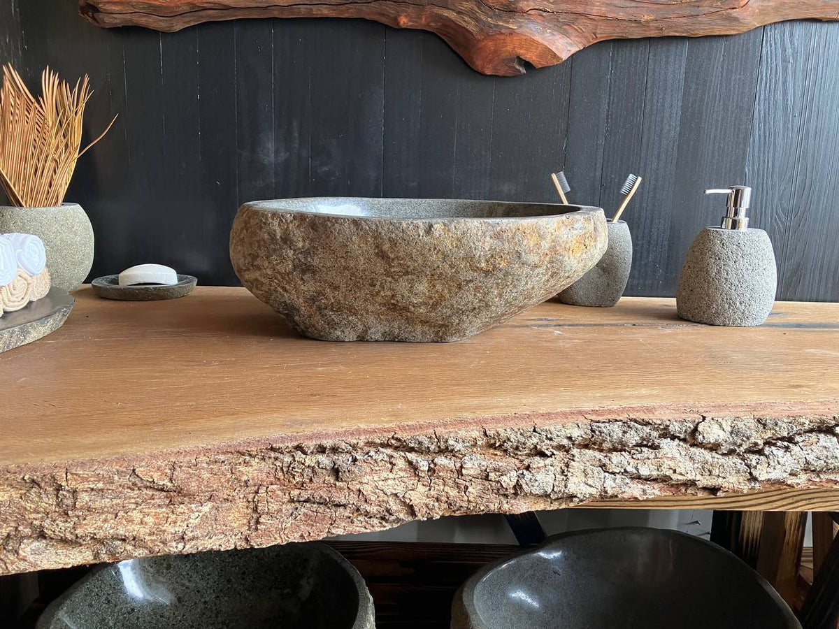 Compact natural river stone vessel sink RSC-069 viewed from above, measuring 16 by 12 inches