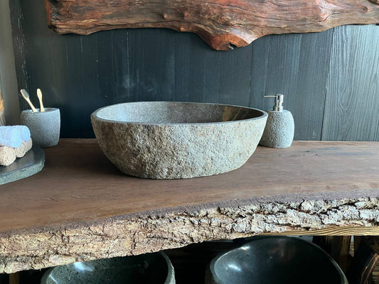 Natural river stone vessel sink RSC-074 with a textured stone exterior