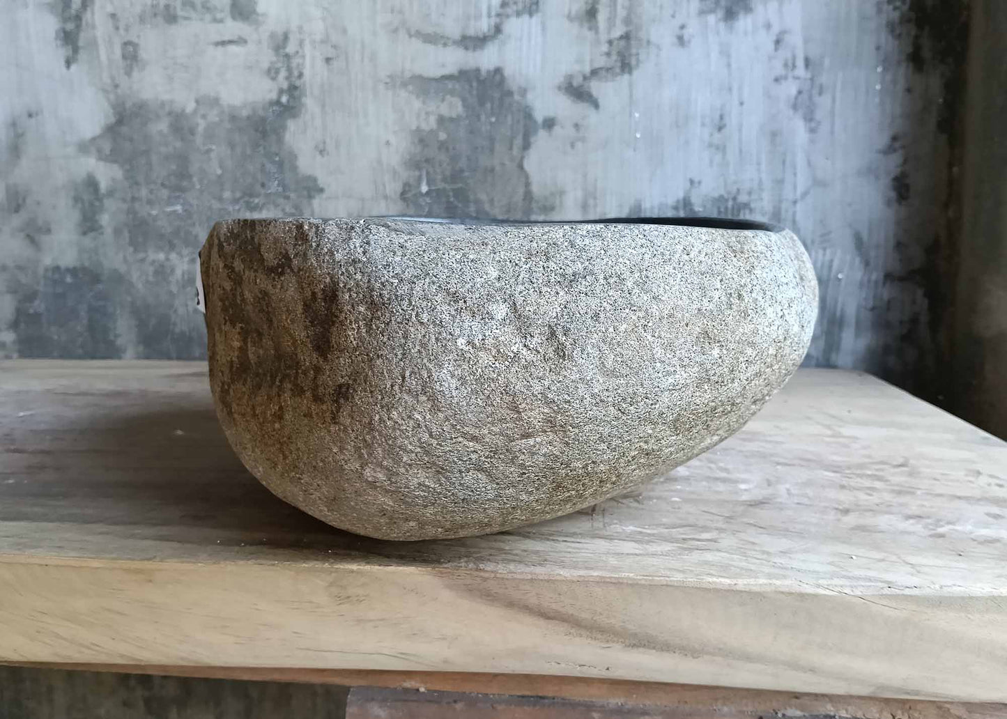 Left angle of stone sink 6512-4133 with curved form and deep gray bowl
