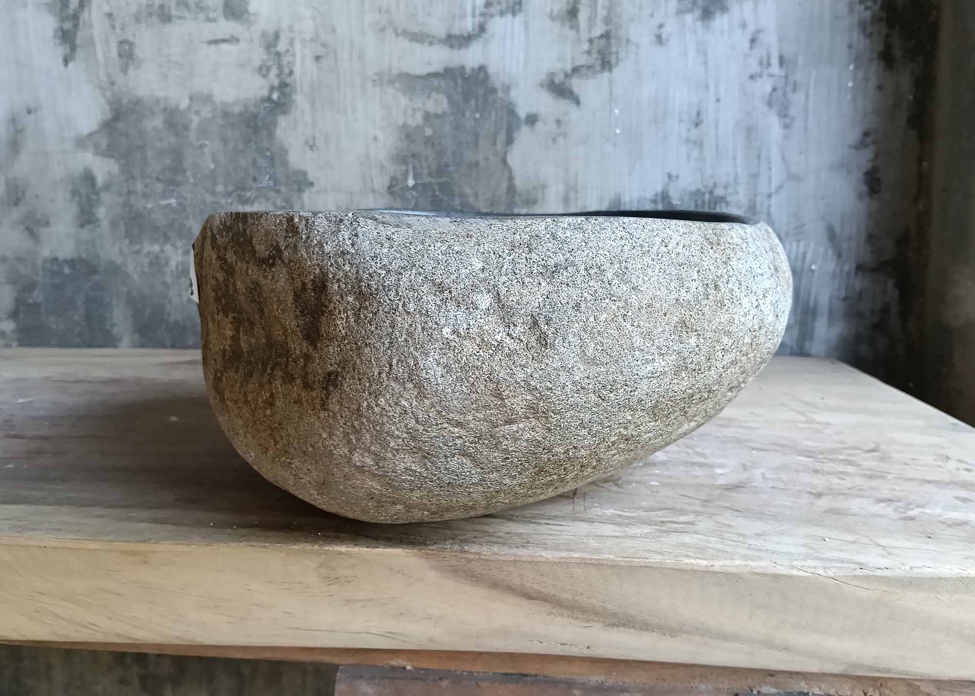 Left angle of stone sink 6512-4133 with curved form and deep gray bowl
