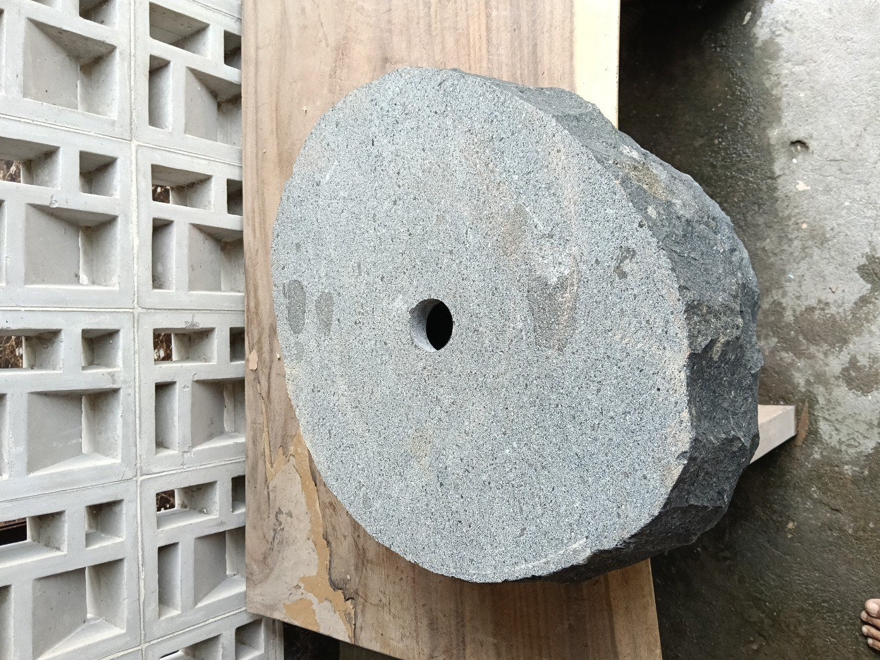 Bottom view of A42-5041 solid andesite stone sink — standard drain hole
