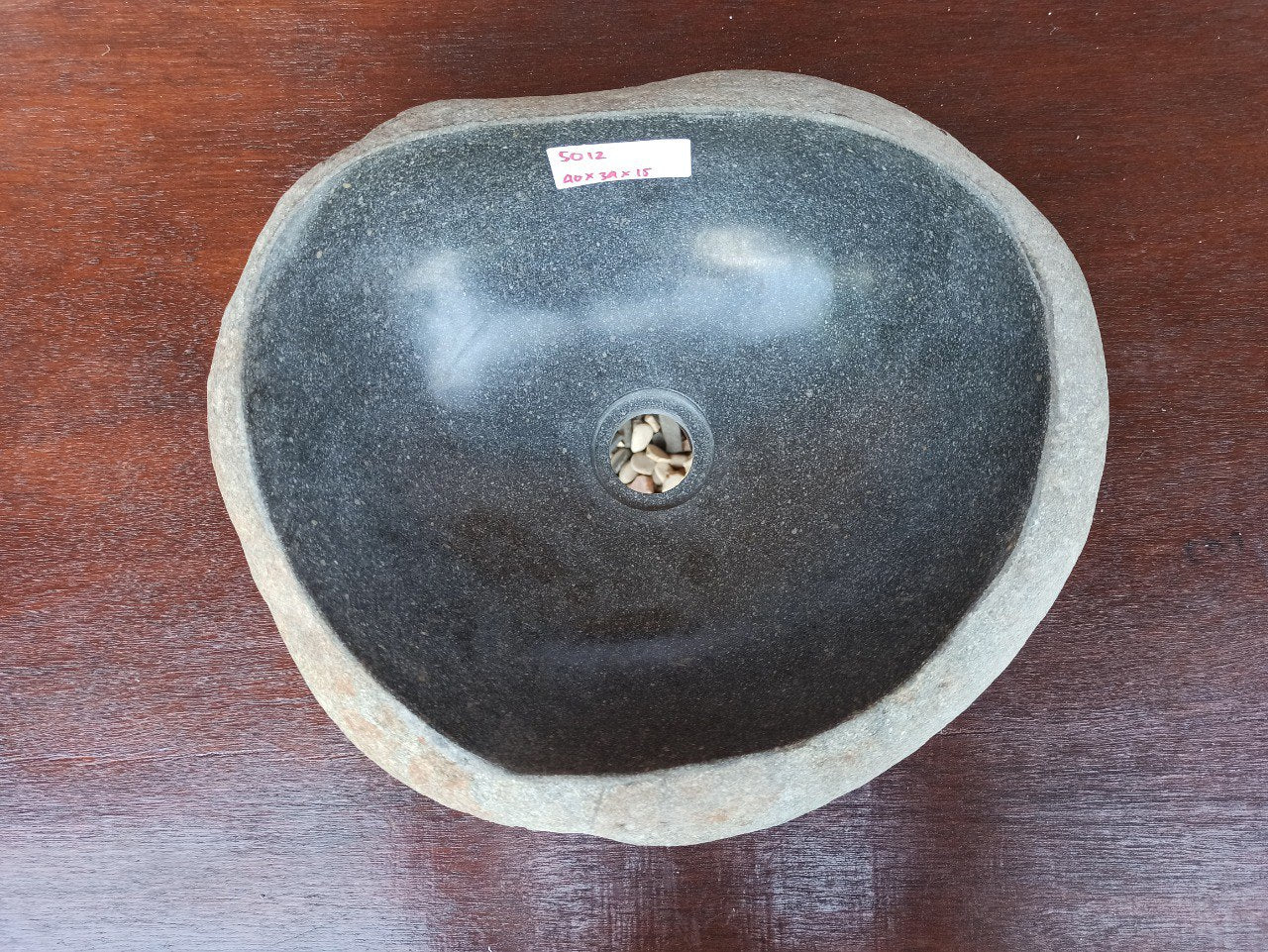 Top view of 5012-4034 charcoal gray river stone sink — polished oval interior
