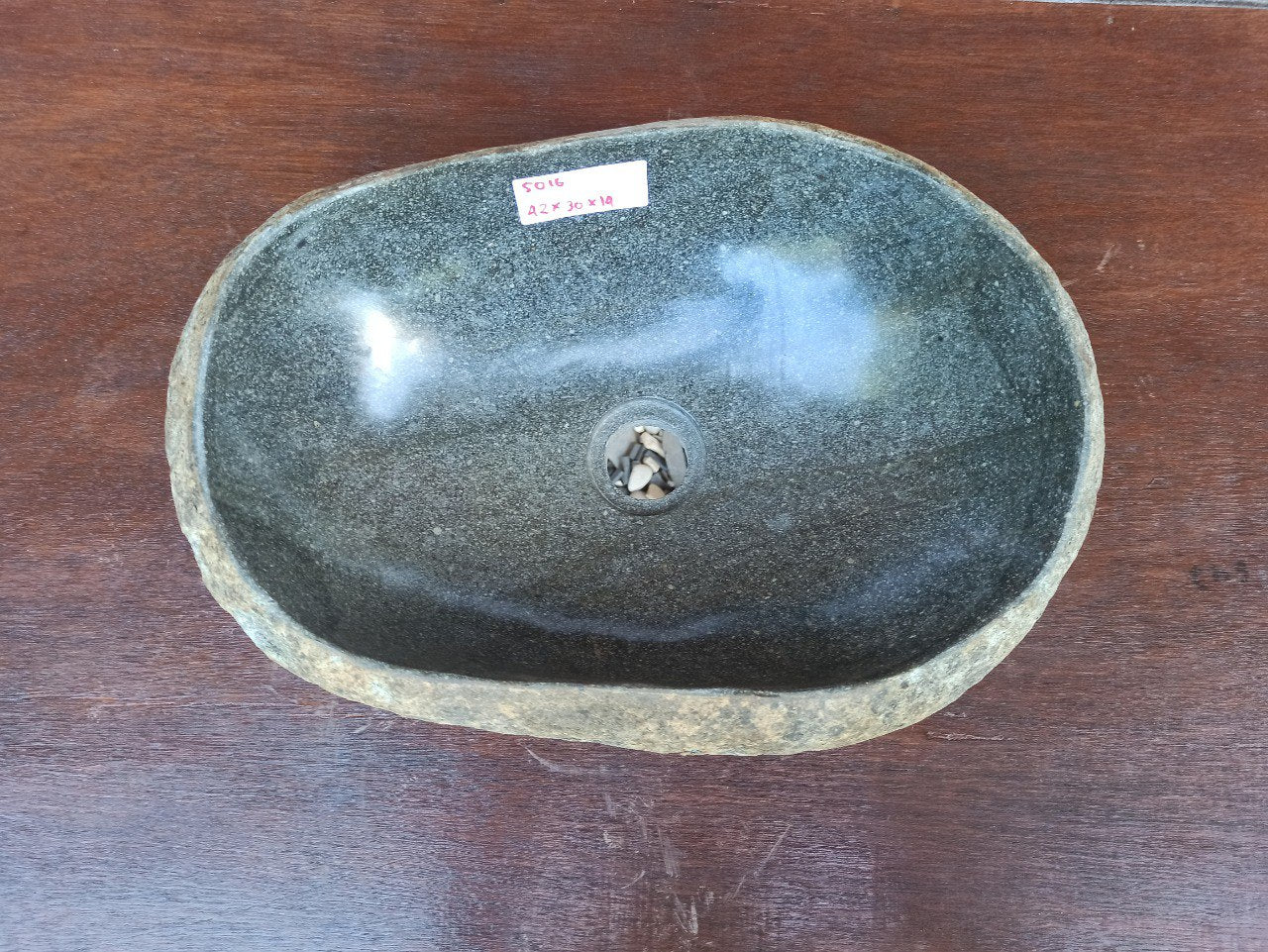 Top view of 5016-423014 natural river stone sink — polished interior and rough textured exterior
