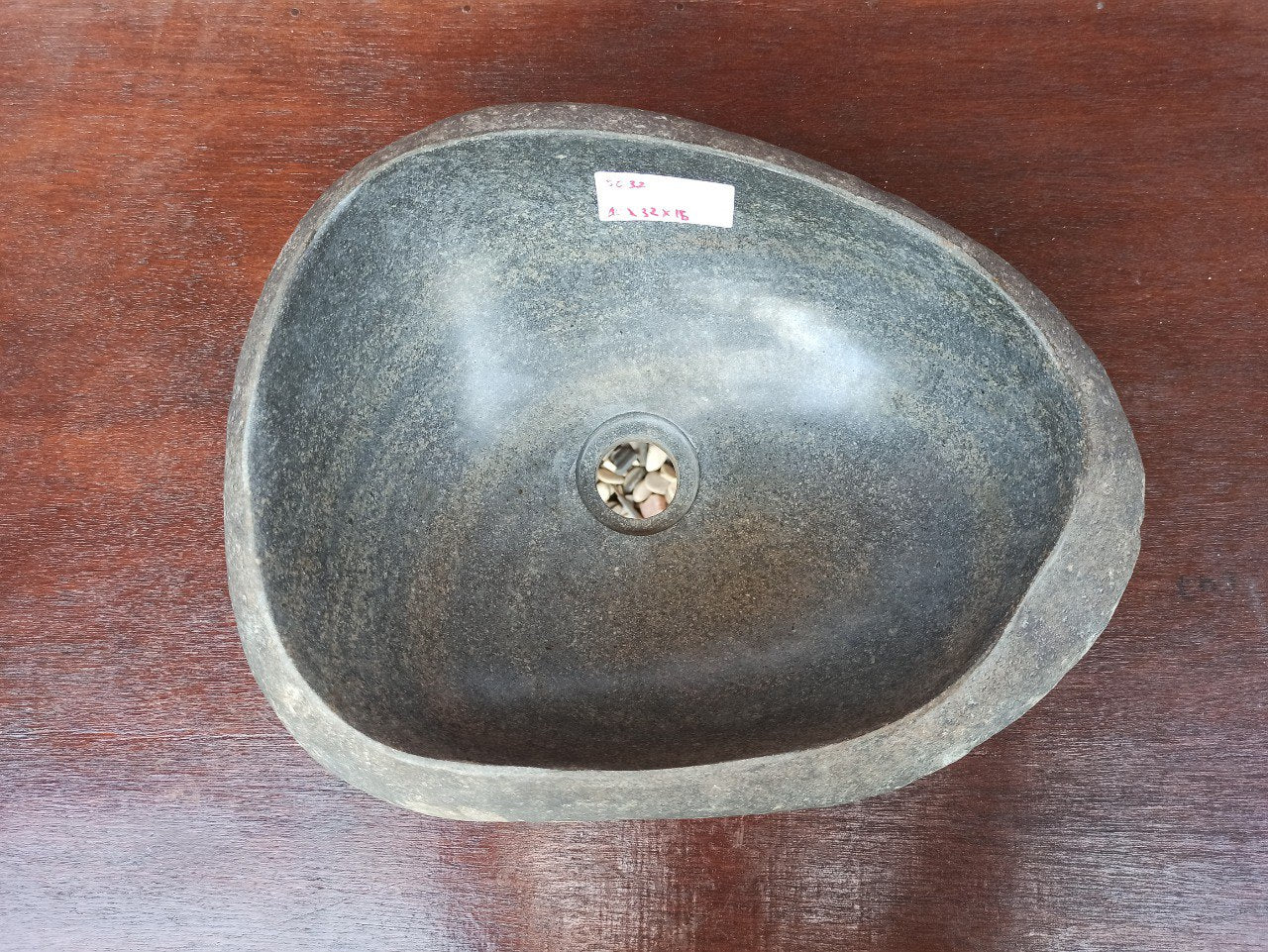 Top view of 5032-4032 natural river stone sink — polished interior and rough exterior texture
