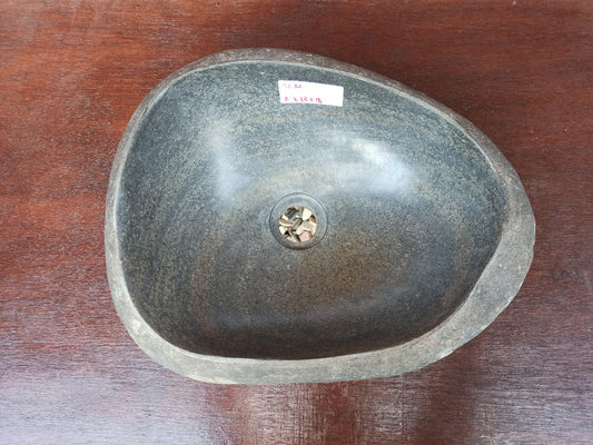 Top view of 5032-4032 natural river stone sink — polished interior and rough exterior texture
