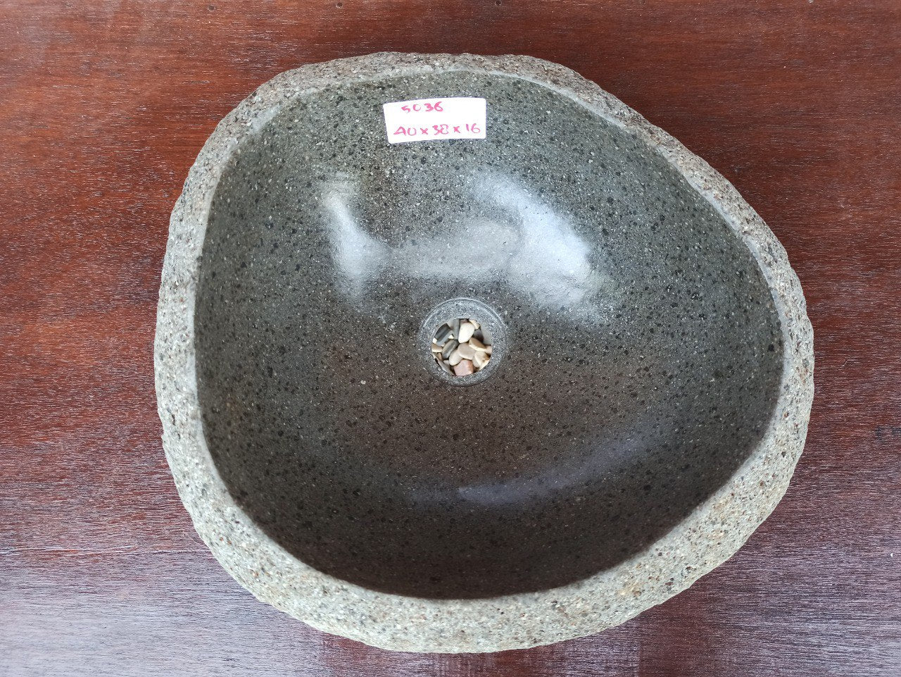 Top view of 5036-403816 natural river stone sink — polished interior and rough exterior finish
