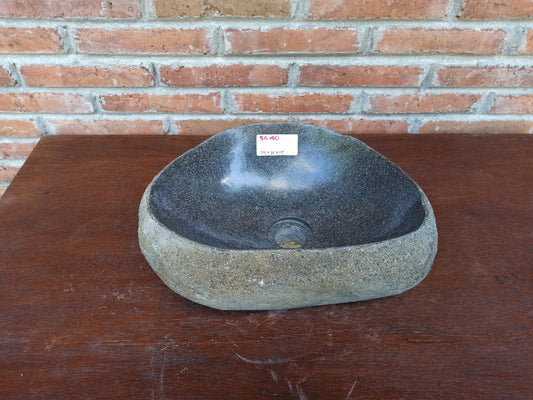Top view of 5040-4930 natural river stone sink — polished interior and natural rough exterior
