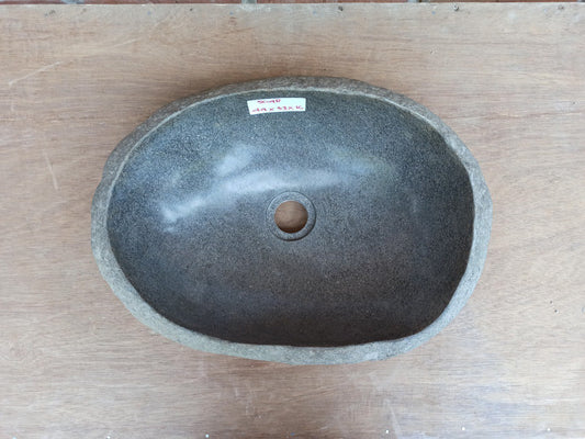 Top view of 5048-443316 natural river stone sink — polished interior and rough stone exterior
