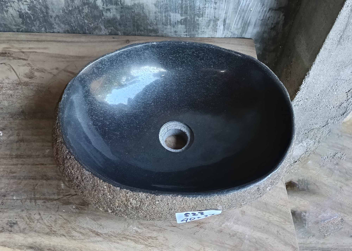 Top view of river stone sink 6523-4033 with polished dark gray interior
