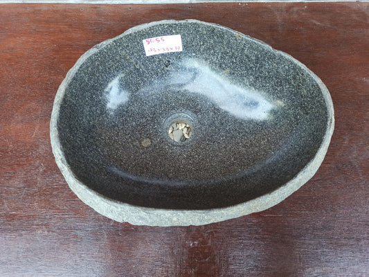 Top view of 5055-433317 natural river stone sink — polished interior and rough exterior finish
