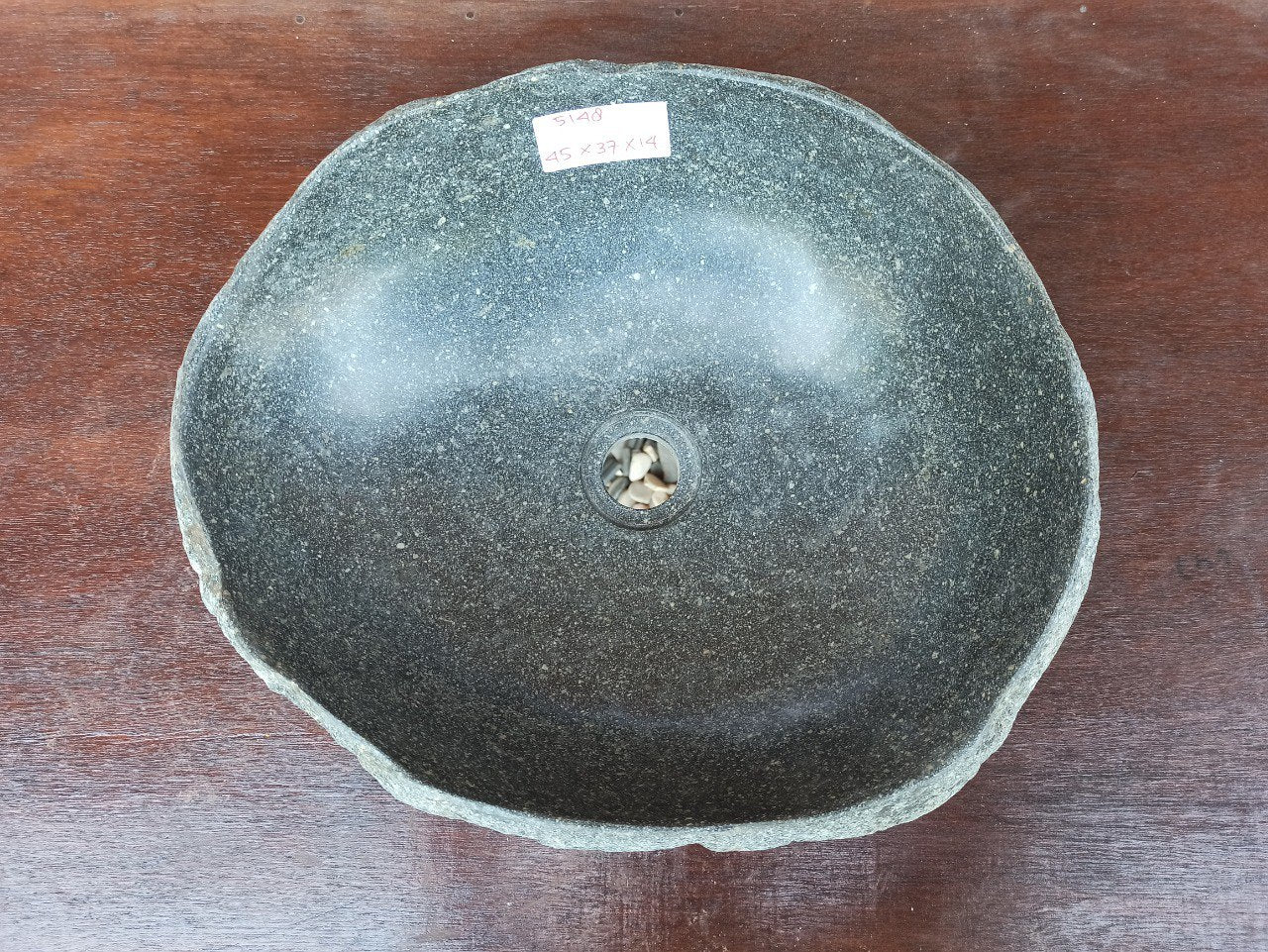 Top view of 5148-453714 river stone sink — polished interior, natural rough exterior
