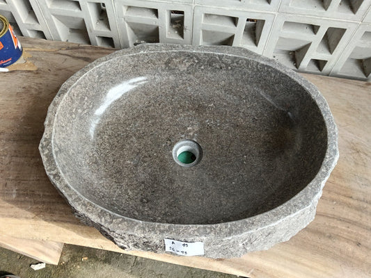 Top view of A49-5643 brown–gray marble sink with polished interior and rough natural exterior, organic round-oval shape.
