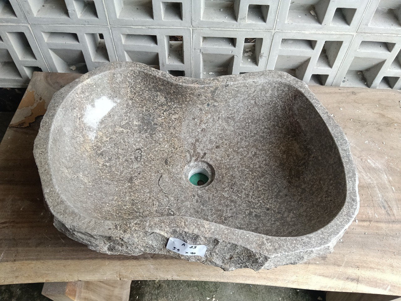 Top view of A29-5940 brown–taupe marble sink with polished interior and rough natural exterior, elongated organic S-shaped design.
