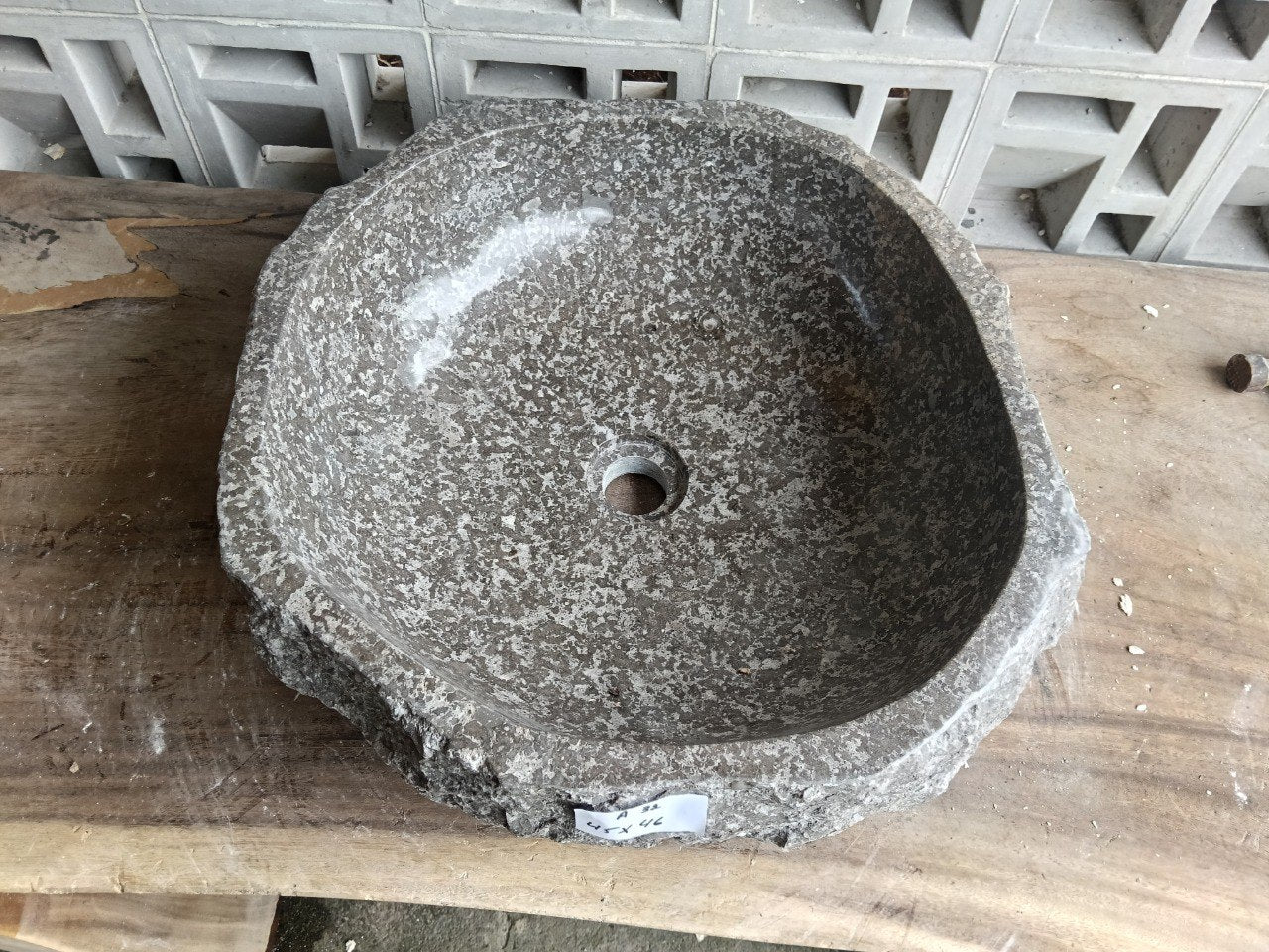 Top view of A32-4546 brown–gray marble sink with polished interior and rough natural exterior, organic round-oval shape.
