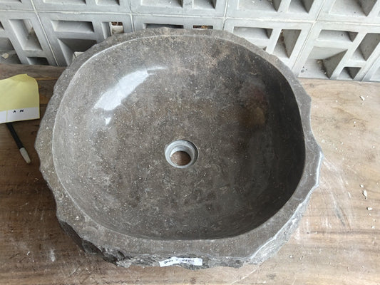 Top view of A34-5045 taupe brown-gray marble sink with polished interior and rough natural exterior, organic round-oval shape.
