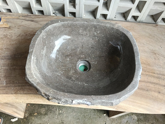 Top view of A47-4638 brown–taupe marble sink with polished interior and rough natural exterior, organic rectangular-oval shape.
