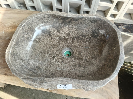 Top view of A64-5542 brown–gray marble sink with polished interior and exterior, elongated organic oval shape.
