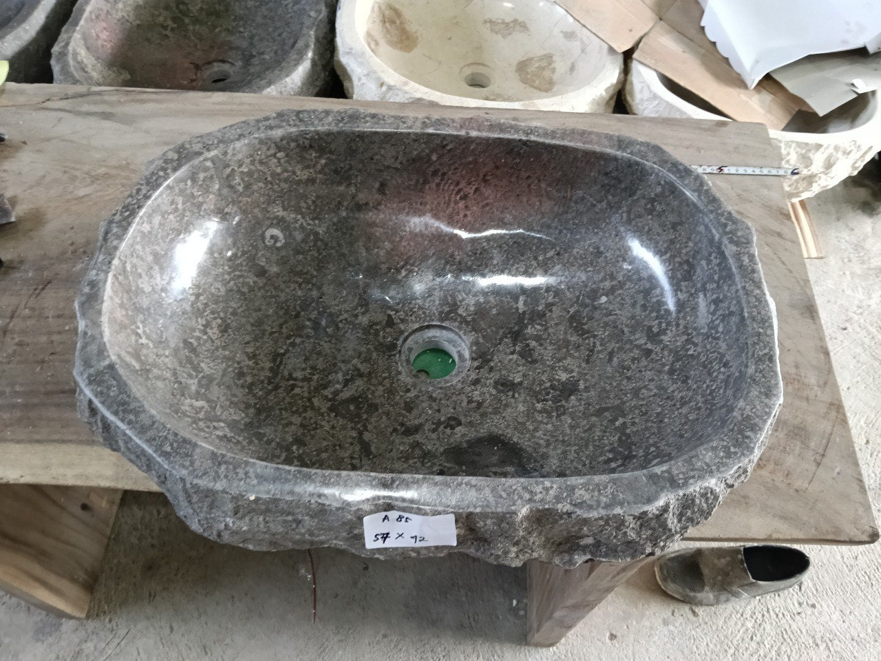 Top view of A85-5742 dark speckled marble sink with polished interior and exterior, organic oval-rectangular shape.
