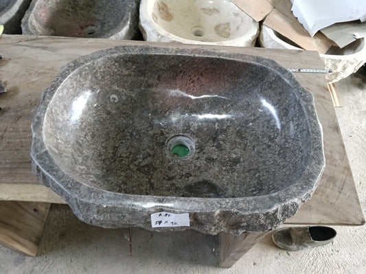 Top view of A85-5742 dark speckled marble sink with polished interior and exterior, organic oval-rectangular shape.
