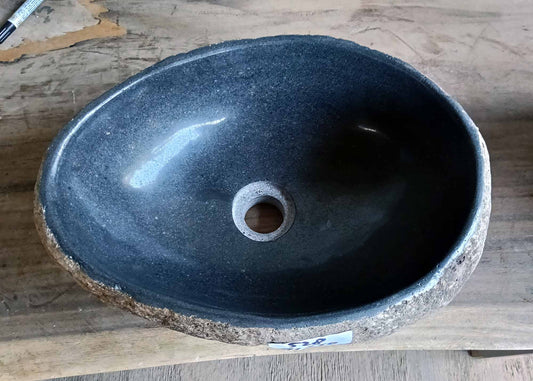 Top view of river stone sink 6528 with dark gray polished interior and unique triangular shape
