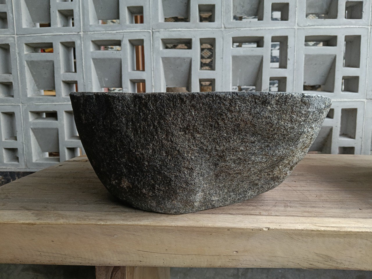 Left side of 6705-4336 triangular river stone sink, graphite gray polished bowl
