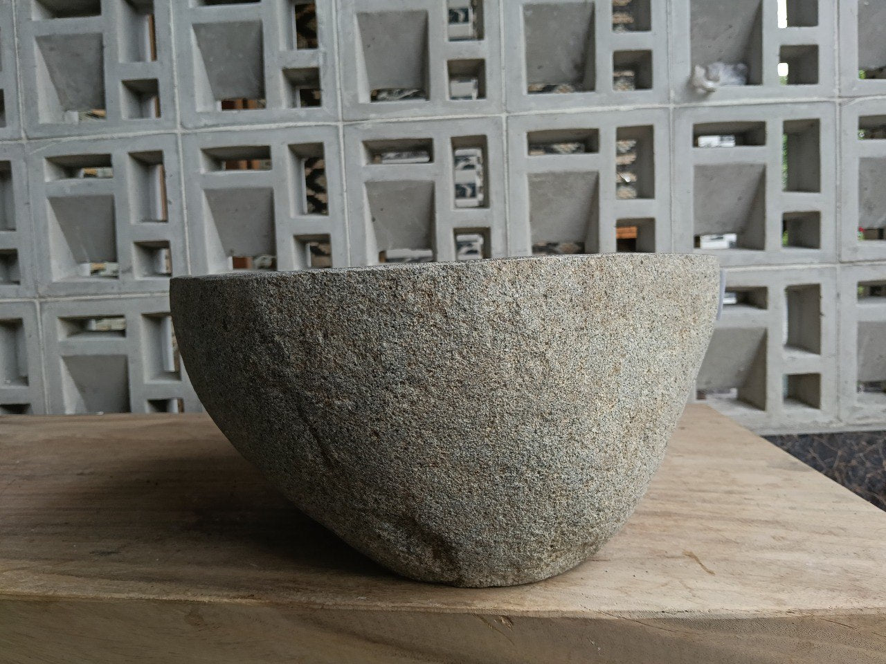 Left side of 6710-4836 river stone vessel sink in light gray-brown natural stone
