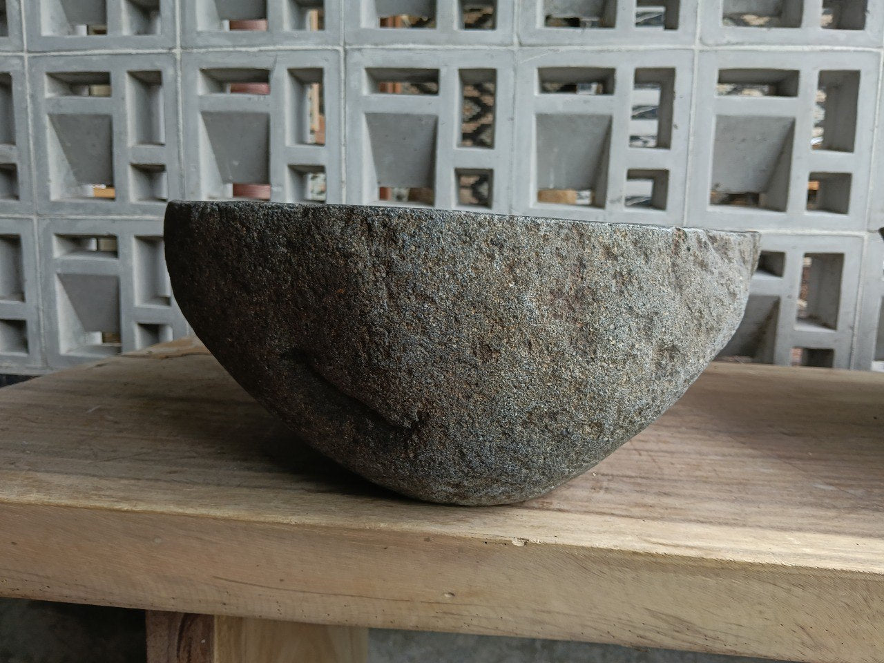 Left side of 6715-4636 river stone vessel sink in gray-brown natural stone
