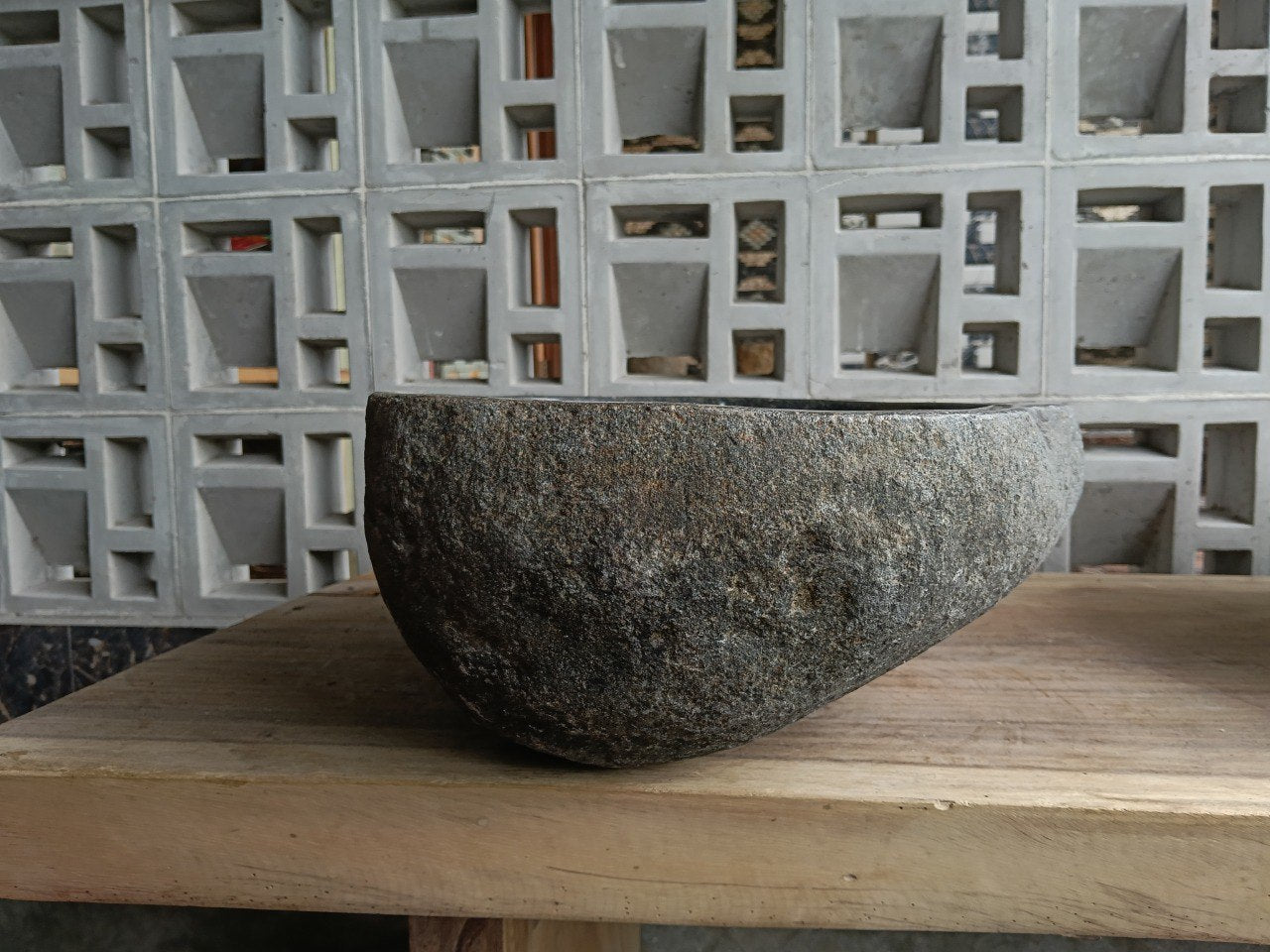 Right side of 6715-4636 organic stone sink, polished bowl and rustic exterior
