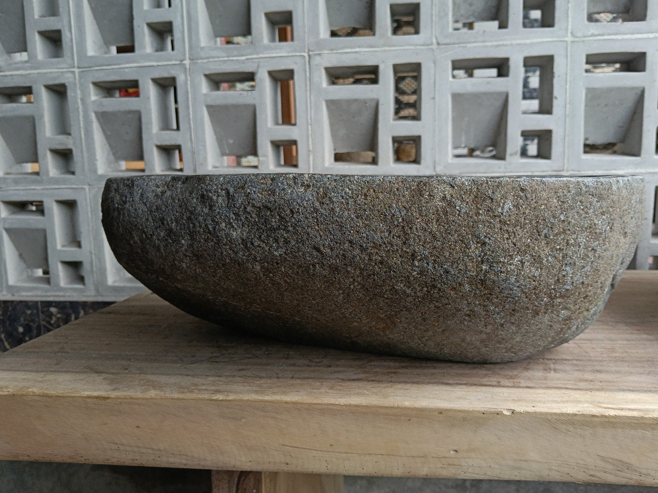 Back view of 6715-4636 handcrafted stone bathroom basin with raw textured exterior
