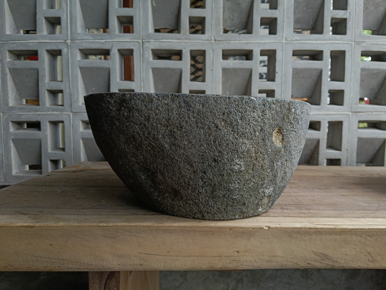 Right side of 6720-4134 organic natural stone sink, polished bowl and rustic exterior
