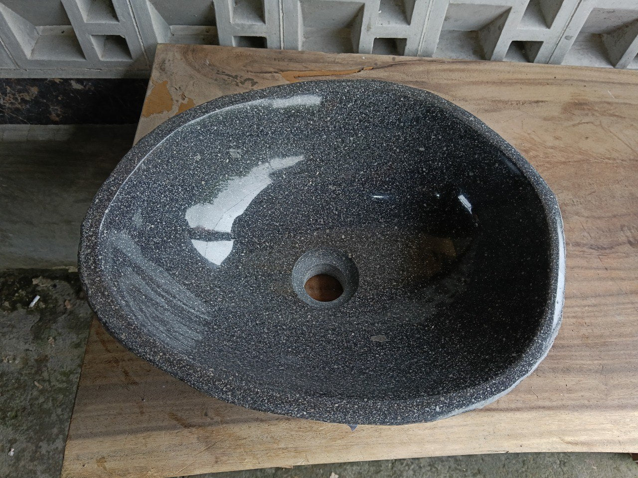 Top view of 6720-4134 graphite river stone sink, polished oval interior
