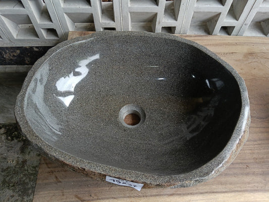 Top view of 6703-4937 graphite river stone sink, polished elongated oval interior
