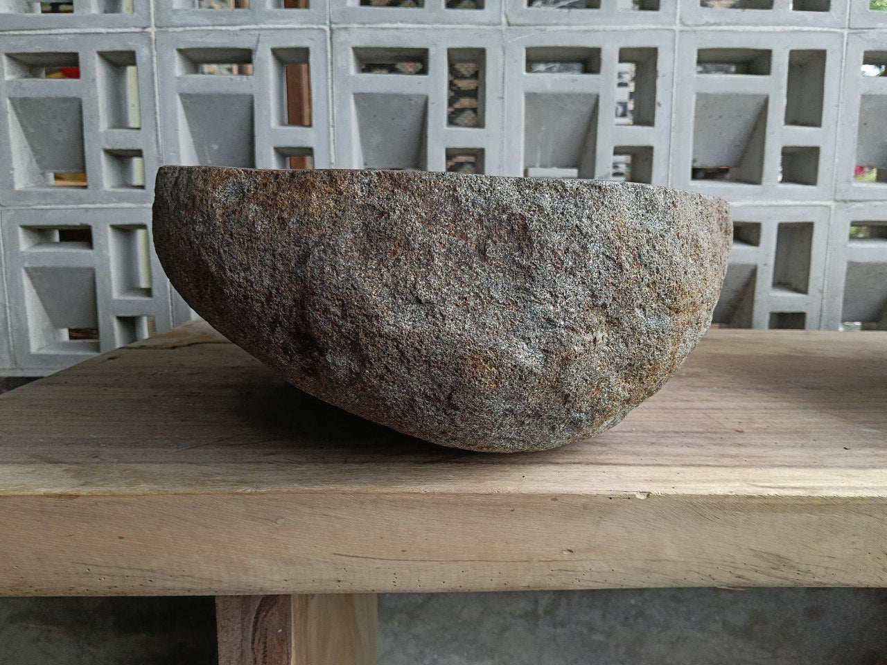 Right side of 6703-4937 organic stone sink, polished bowl and rustic exterior
